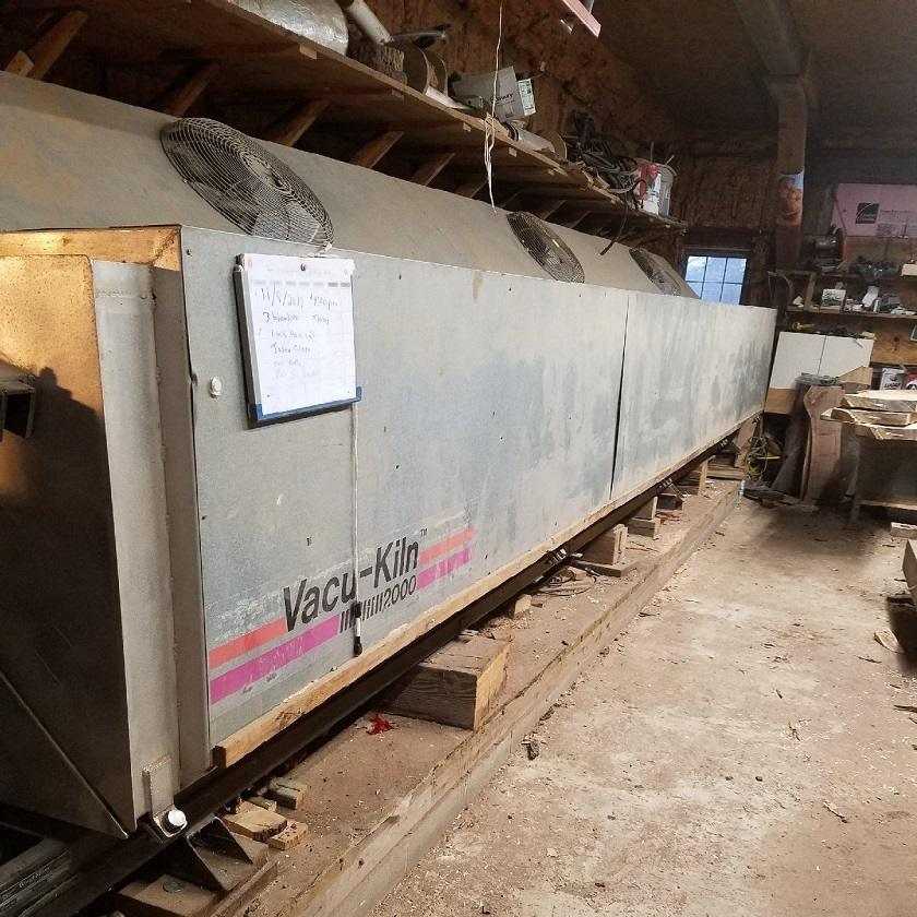 Thick oak slab being dried in our express vacuum kiln